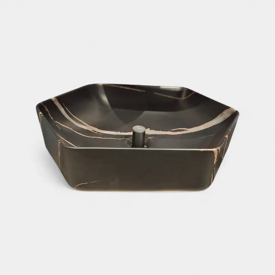Lavamanos de sobreponer tipo Vessel exagonal en negro mármol, diseño elegante y moderno de Innova Hogar, ideal para baños contemporáneos.