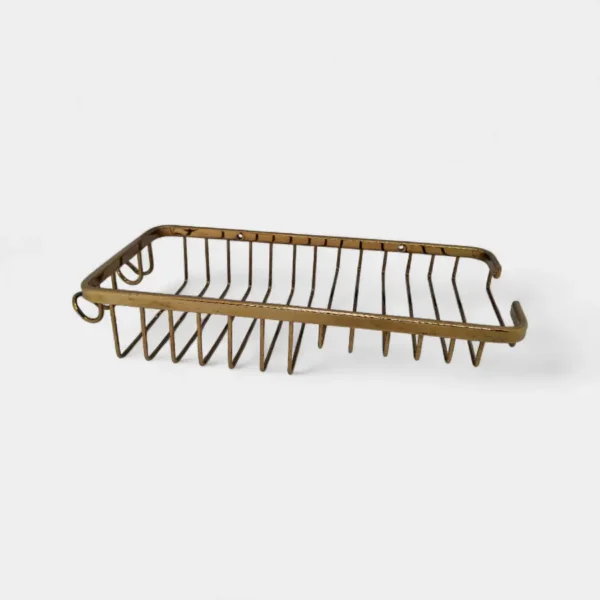 Canastilla organizadora de rejilla en acabado dorado – Elegancia y ventilación óptima para productos de baño en INNOVA HOGAR