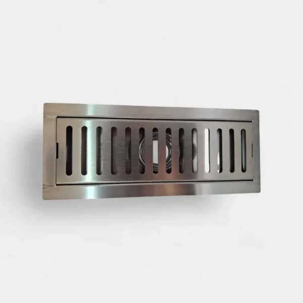 Rejilla anti olor de 10x30 cm en acero inoxidable cepillado – Durabilidad y elegancia para baños modernos en INNOVA HOGAR